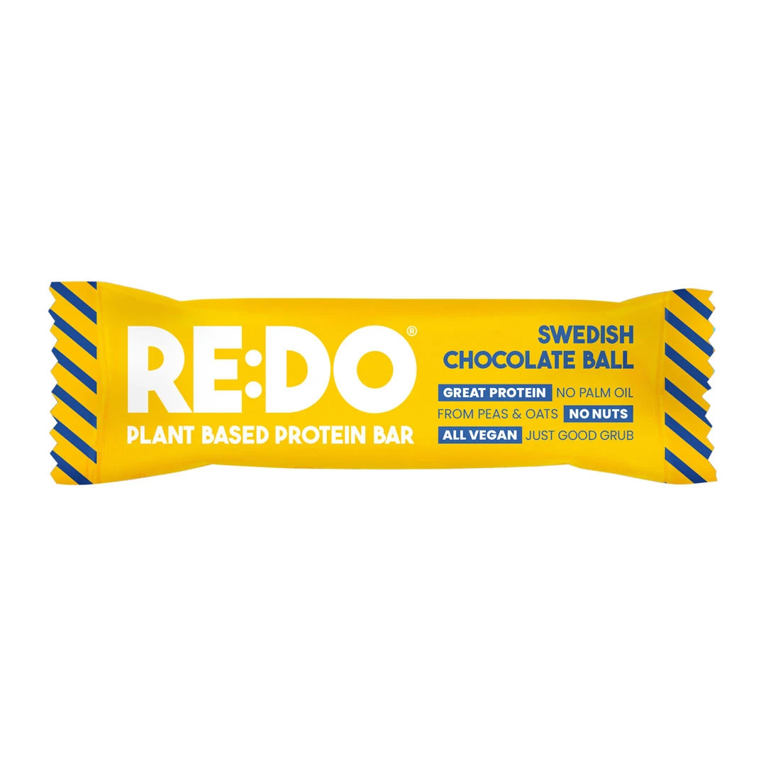 REDO Bar 60 g vegansk proteinbar i en gul forpakning med blå detaljer for smaken Swedish Chocolate Ball., bilde 4 av 4