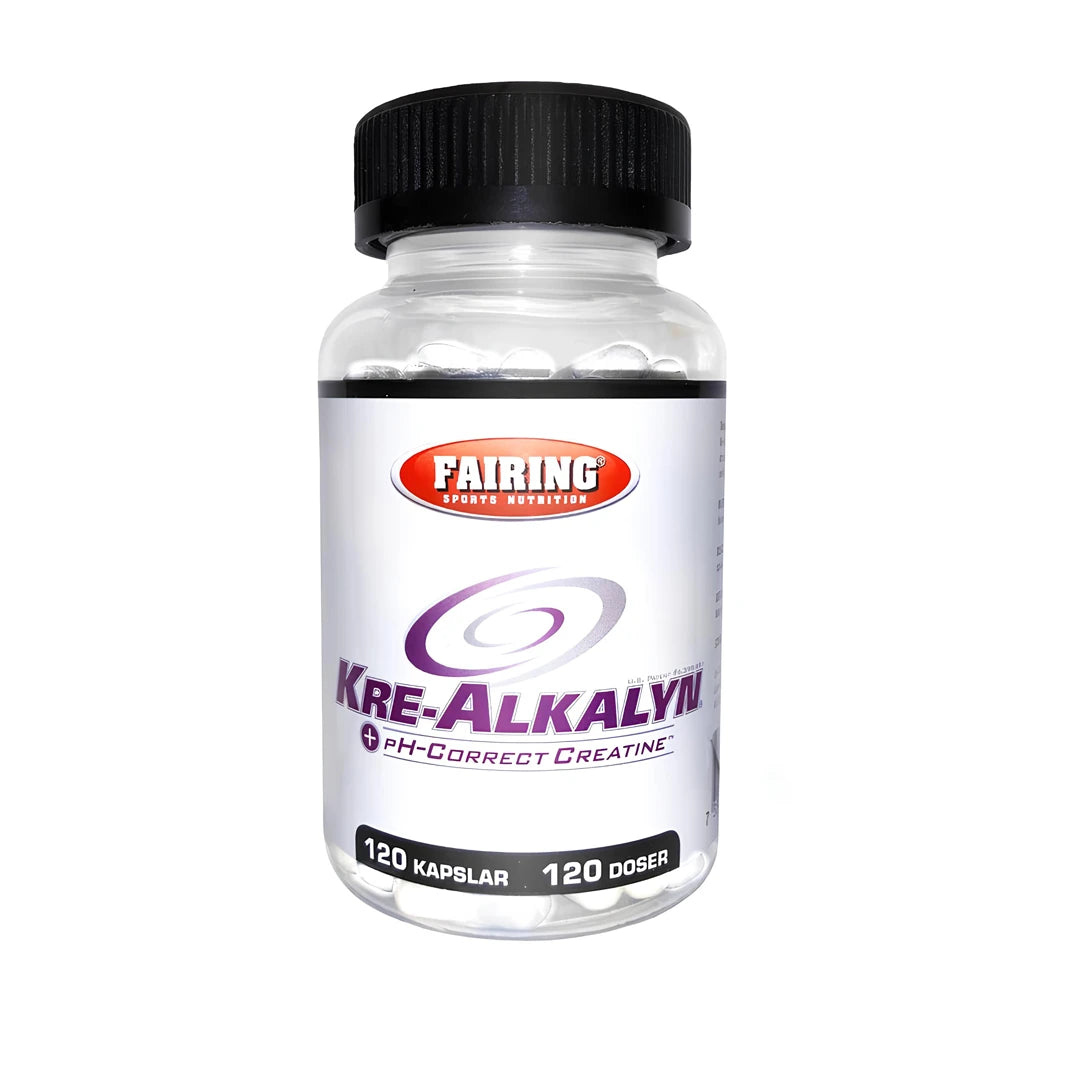Fairing Kre-Alkalyn 120 caps er et kreatintilskudd i form av hvite kapsler i en transparent boks med svart lokk og hvit etikett med lilla detaljer.
