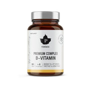 Pureness Premium Complex B-Vitamin 60 caps förpackad i en brun burk med silverlock och vit etikett.