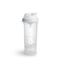 GAAM Smartshake Slim 500 ml shaker i gjennomsiktig plast med hvitt lokk, hvit logo og et ekstra rom i bunnen.