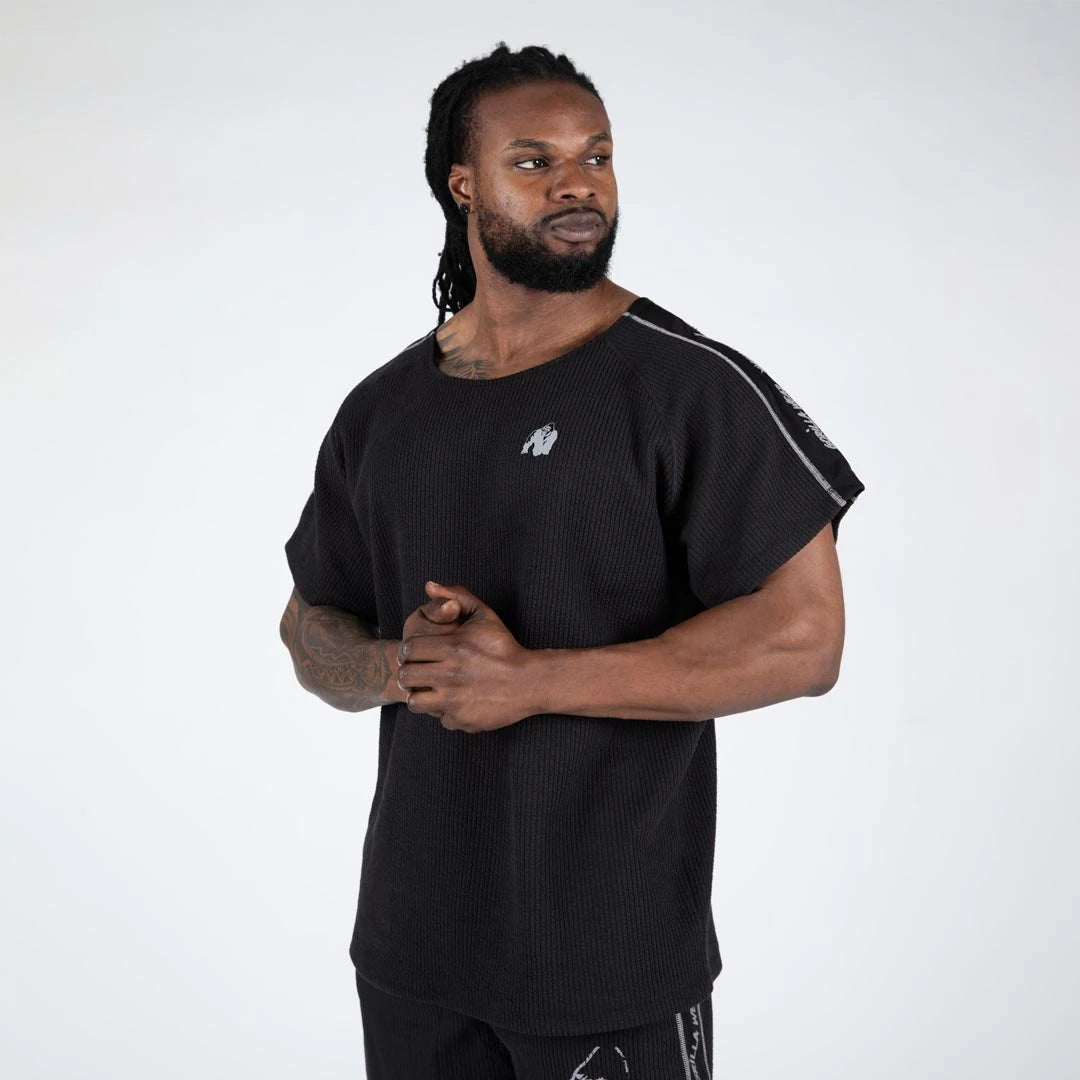 Gorilla Wear Buffalo Old School Workout Top black/grey er en svart og ribbet trenings-t-skjorte i oversized passform.