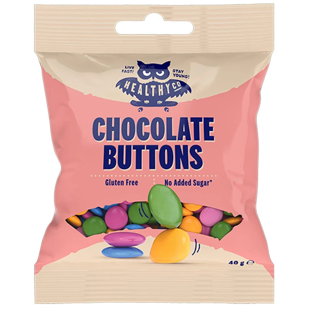 Healthyco Chocolate 40 g i en beige og rosa pose fylt med fargerike, sukkerfrie sjokoladeknapper.