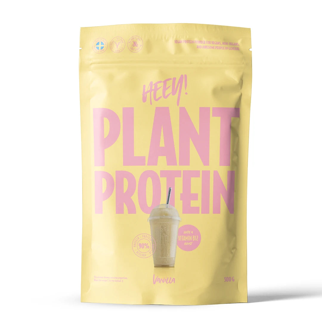 Heey! Vegansk Protein 500 g proteinpulver i en lysegul pose med rosa tekst for smaken vanilje., bilde 3 av 9