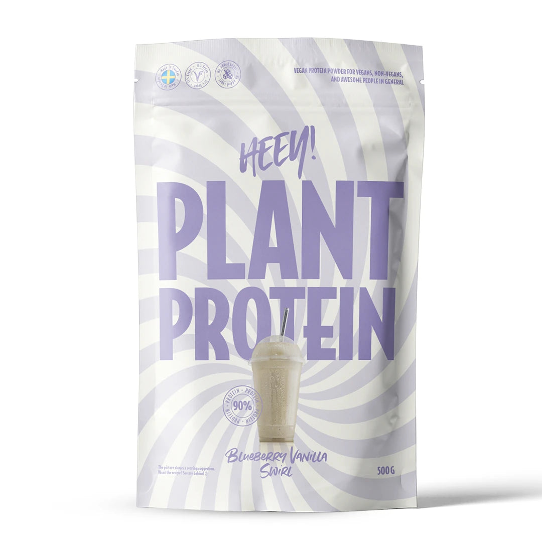 Heey! Vegansk Protein 500 g proteinpulver i en hvit og lyslilla pose for smaken Blueberry Vanilla Swirl., bilde 5 av 9