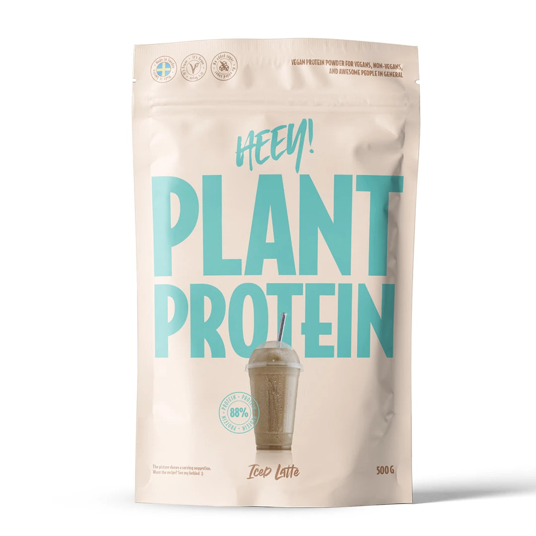 Heey! Vegansk Protein 500 g proteinpulver i en beige pose med turkis tekst for smaken Iced Latte., bilde 6 av 9
