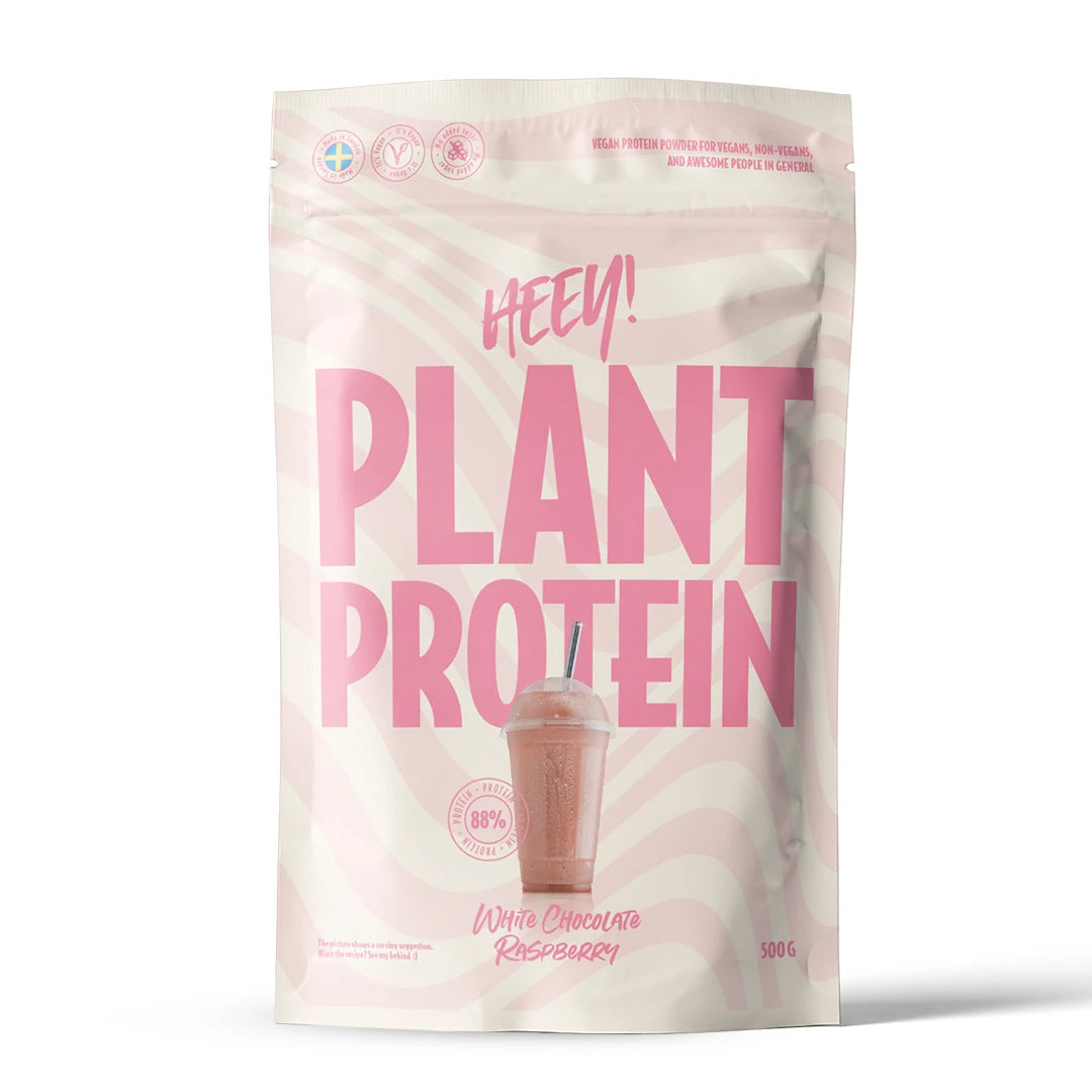 Heey! Vegansk Protein 500 g proteinpulver i en hvit og rosa bølgete pose med smaken Hvit Sjokolade Bringebær., bilde 7 av 9