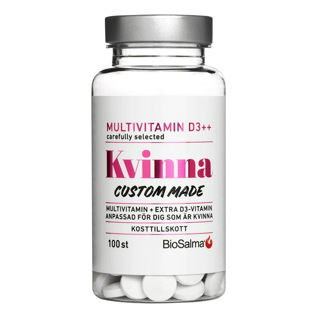 BioSalma Multivitamin Kvinna D3++ 100 tabs i en gjennomsiktig boks med hvit etikett, rosa detaljer og sølvlokk.