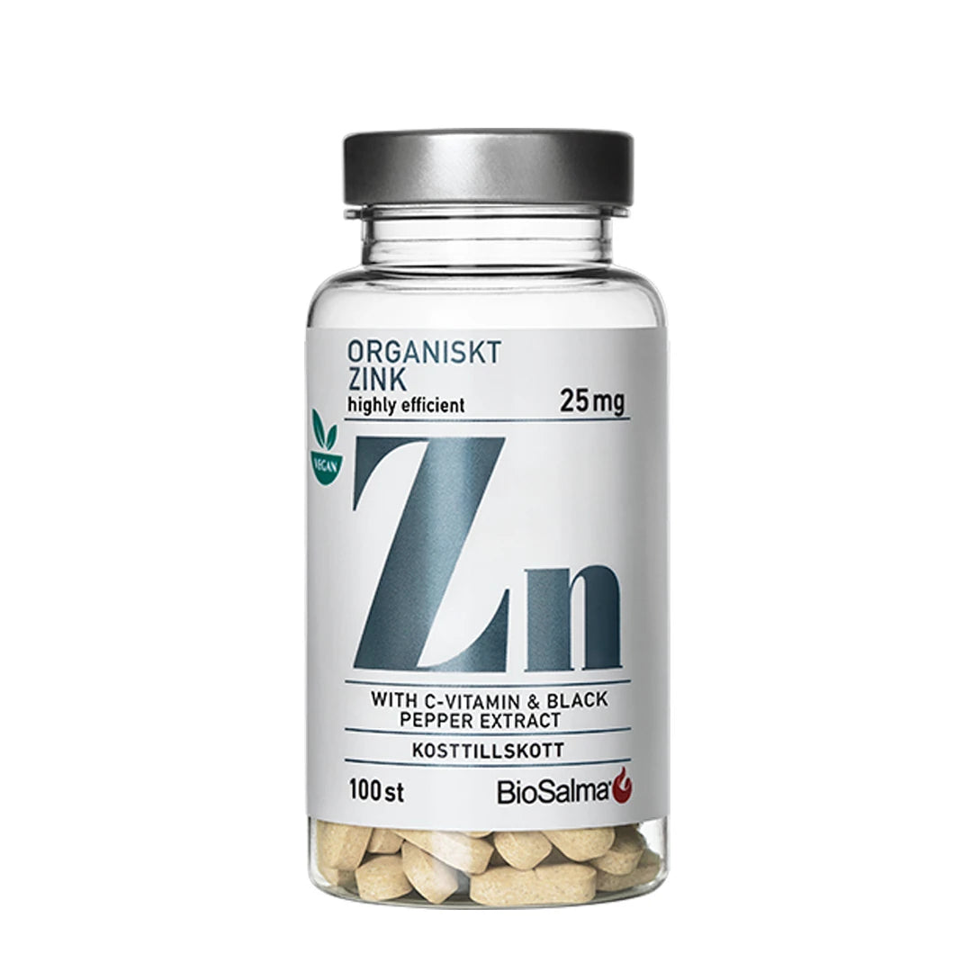 BioSalma Organiskt Zink 25 mg 100 tabs i en transparent boks med sølvlokk, hvit etikett og synlige tabletter.
