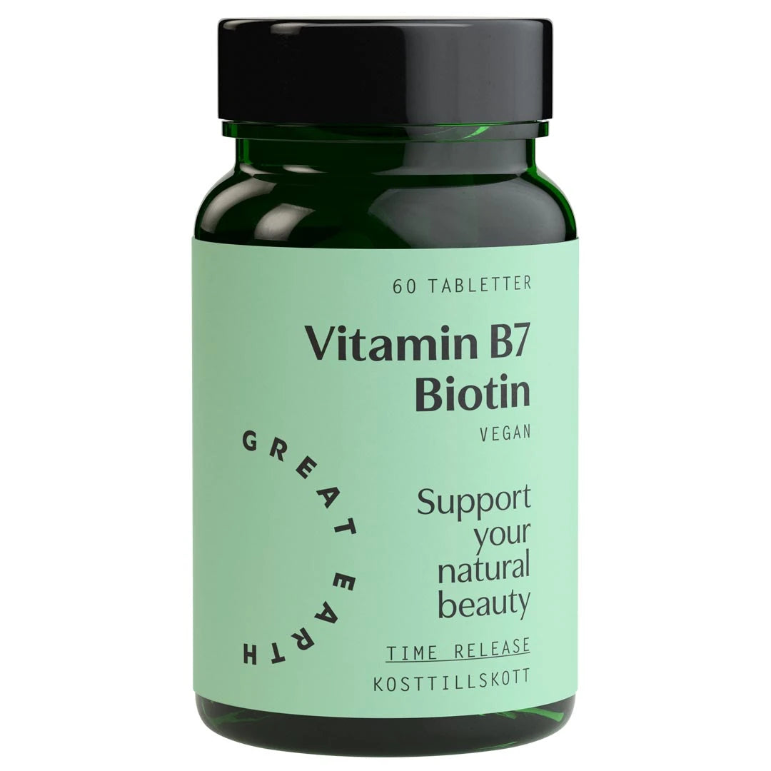 Great Earth Vitamin B7 - Biotin 60 tabs kosttilskudd i en mørkegrønn boks med lysegrønn etikett og svart lokk.