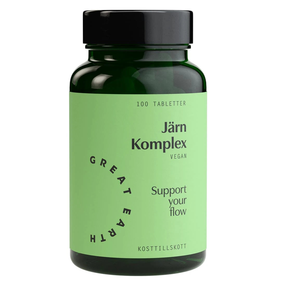 Mørkegrønn boks med lysegrønn etikett og svart lokk med Great Earth Järn Komplex 100 tabs veganske jerntabletter.