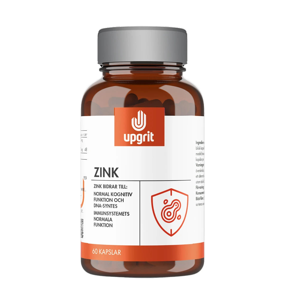 Upgrit Zink 60 caps kosttilskudd i en mørkebrun boks med grått lokk, hvit etikett og oransje logo.