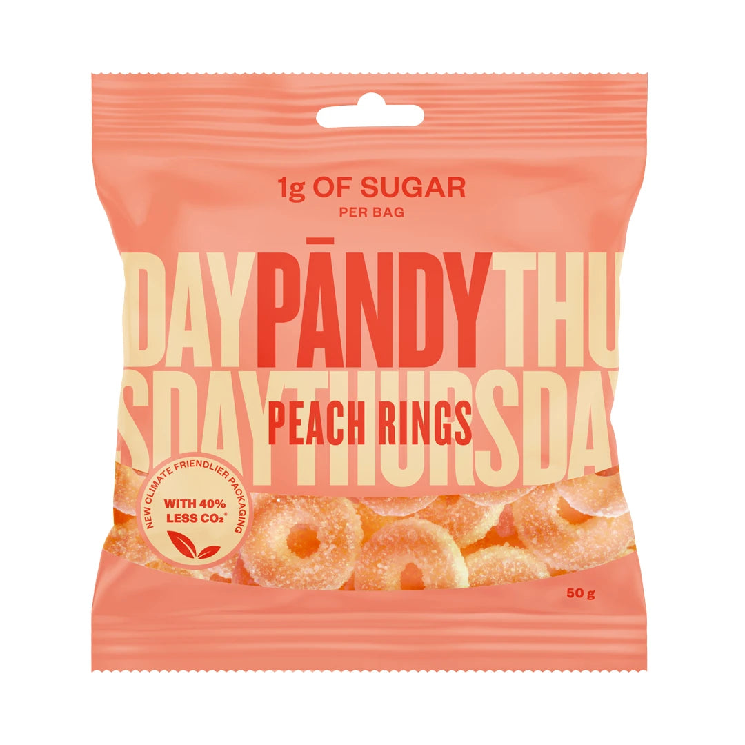 Pändy Candy Peach Rings 50 g i en ferskenfarget pose fylt med sukkerfrie gelé- og skumringer.