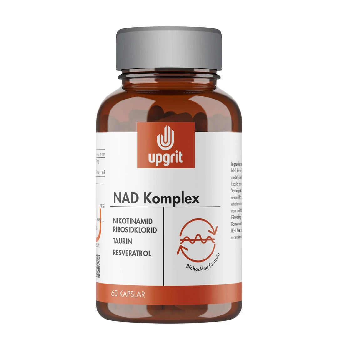 Upgrit NAD-Komplex 60 kapsler i en brun glasskrukke med hvit etikett og oransje detaljer.