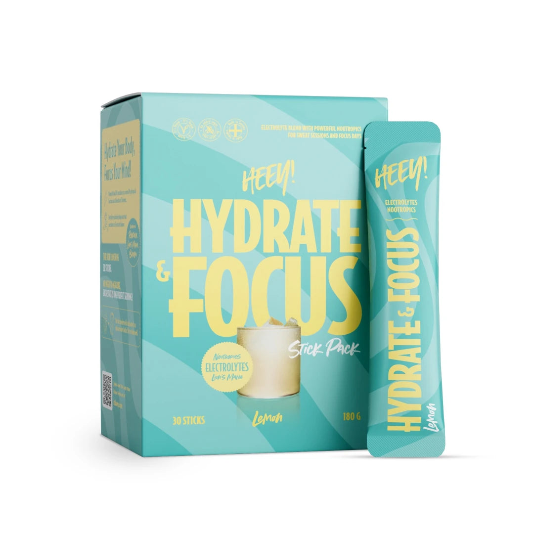 Heey! Hydrate & Focus Electrolytes + Lions Mane 30 x Stick Pack Lemon i turkis eske og porsjonspose.