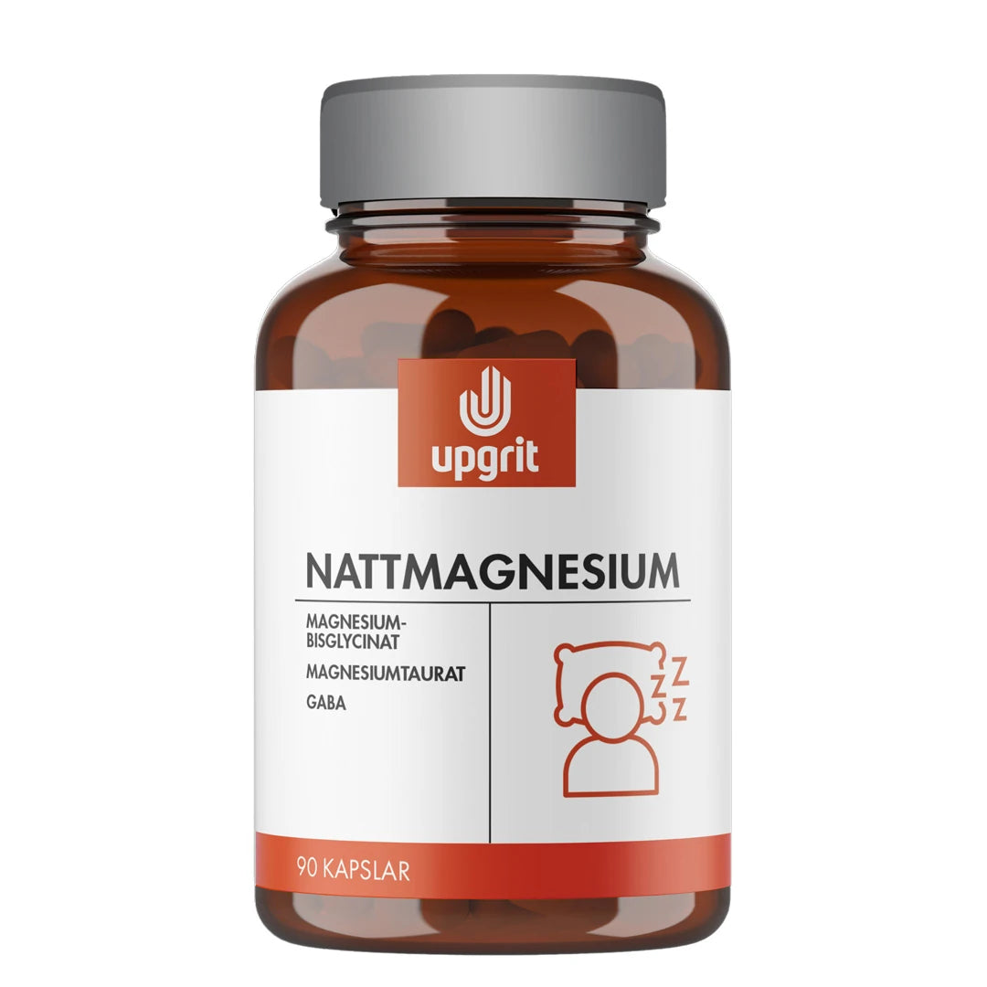Upgrit Nattmagnesium 90 caps i en brun glasskrukke med grått lokk og hvit etikett med røde detaljer.