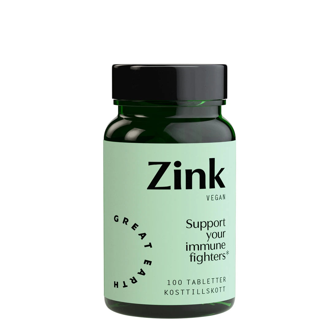Great Earth Zink 25 mg 100 tabs i en mørkegrønn boks med svart lokk og lysegrønn etikett.