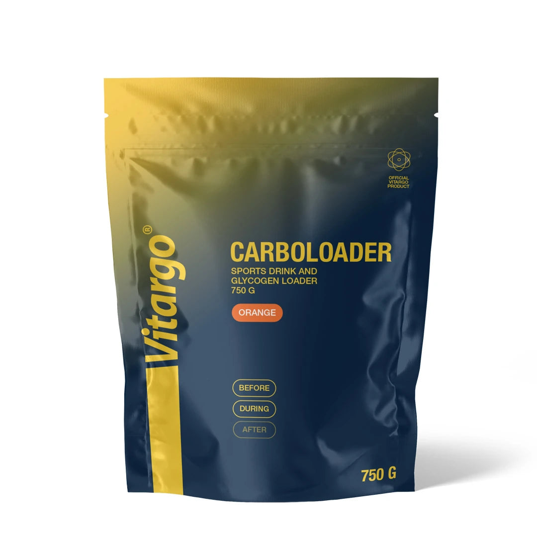 Vitargo Carboloader 750 g sportsdrikkpulver i en mørkeblå pose med gule detaljer og tekst for appelsinsmak.