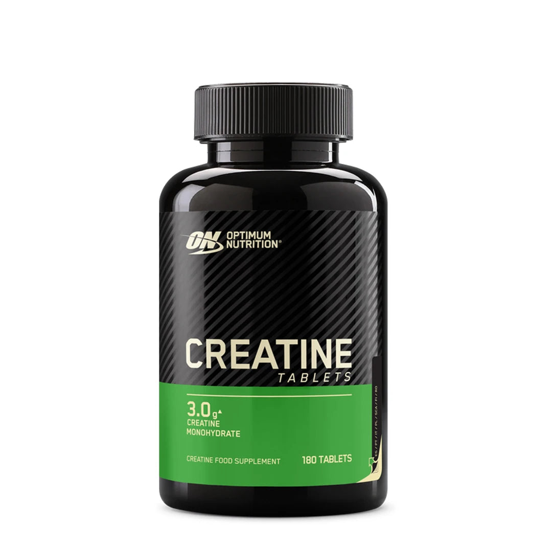 Optimum Nutrition Creatine Tablets 180 tabs i en svart boks med grønn etikett.