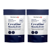 2 x BioSalma Creatine Monohydrat 500 g pulver i två vita och marinblå påsar.