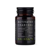 KIKI Health Activated Charcoal 50 caps i en mörk glasburk med svart etikett och vita detaljer.