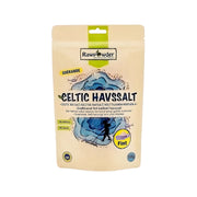 Rawpowder Celtic Havssalt Fint 500 g, förpackat i en beige påse med blå havsmotiv.