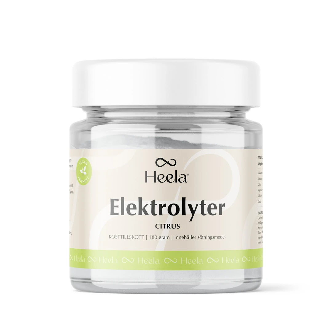 Heela Elektrolyter 180 g elektrolyttpulver med sitrussmak i en gjennomsiktig boks med hvitt lokk og lysegrønn etikett.