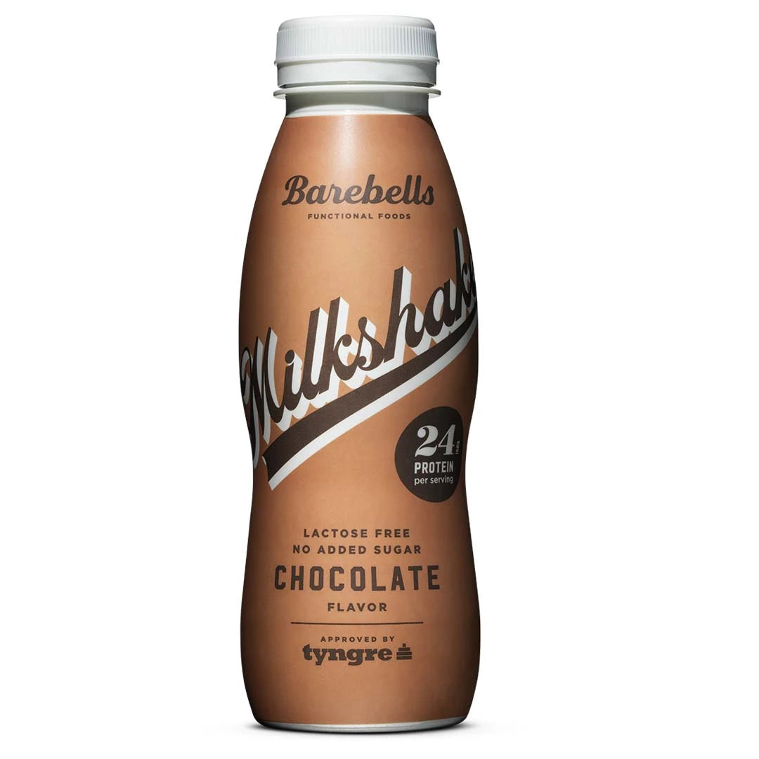 Barebells Milkshake 330 ml proteindrikk i en brun flaske med sjokoladesmak, laktosefri og uten tilsatt sukker.