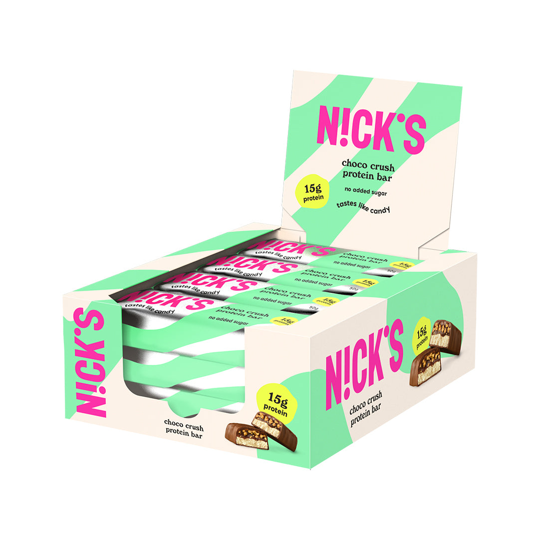12 x NICKS Soft bar 50 g Choco Crush SUPER DEAL i en hvit og lysegrønn eske med rosa detaljer.