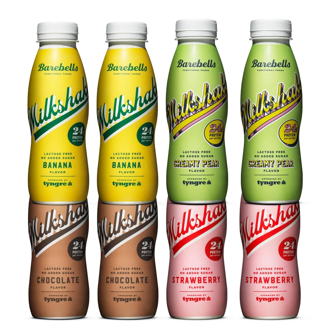 8 x Barebells Milkshake 330 ml Mixflak med åtte plastflasker i smakene Banana, Creamy Pear, Chocolate og Strawberry.