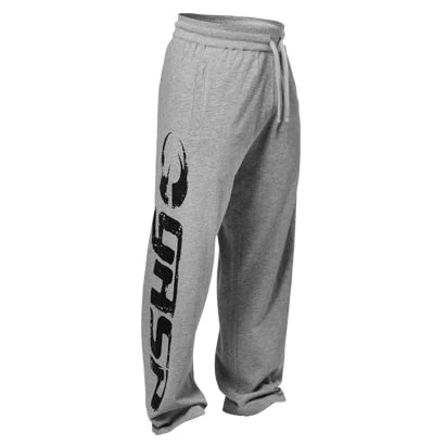 GASP Sweat Pants Greymelange er gråmelerte treningsbukser med løs passform, snøring og stort svart logotrykk på benet., bilde 5 av 6