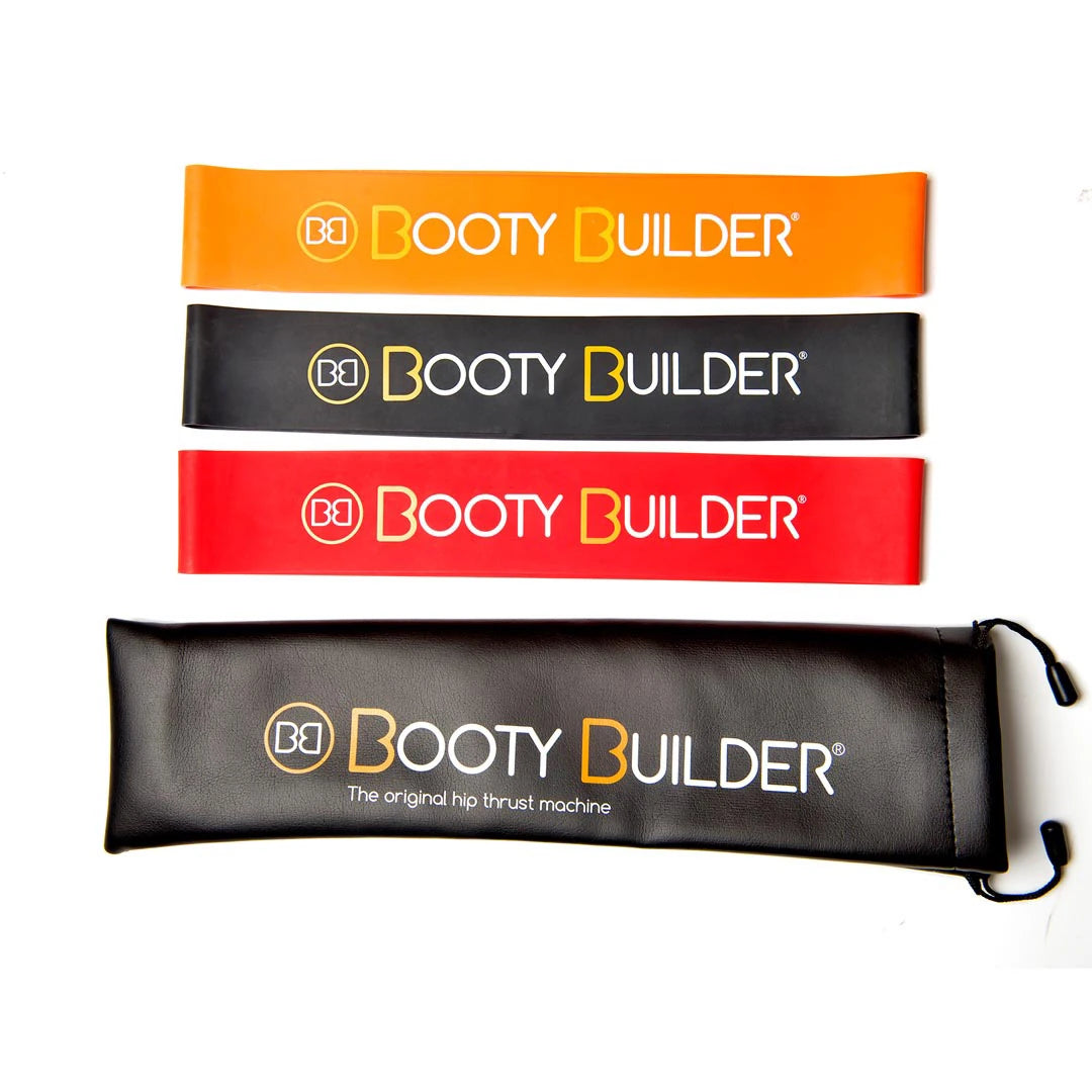 Booty Builder Mini Bands Black 3-Pack, treningsbånd av naturgummi i oransje, svart og rødt med svart oppbevaringspose.
