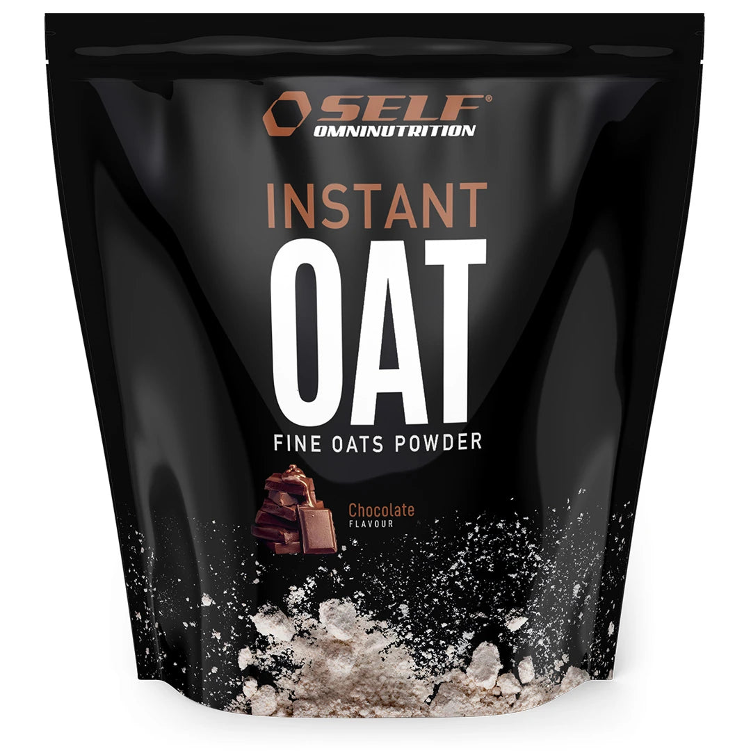 Self Omninutrition Instant Oat 1 kg finmalt havremel i en svart pose med illustrasjon av sjokoladebiter for smaken Chocolate.