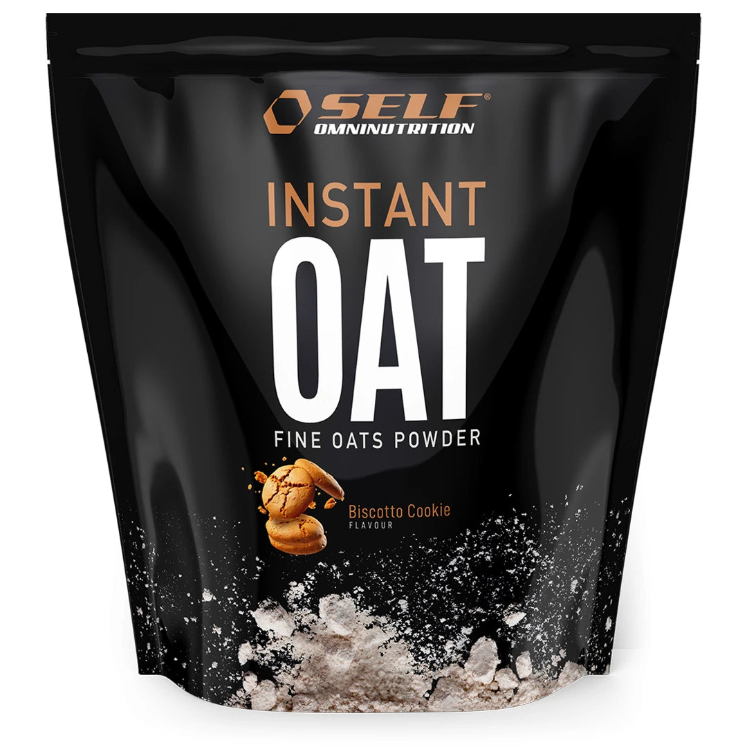 Self Omninutrition Instant Oat 1 kg havremel i en svart pose med illustrasjon av kjeks for smaken Biscotto Cookie., bilde 10 av 14