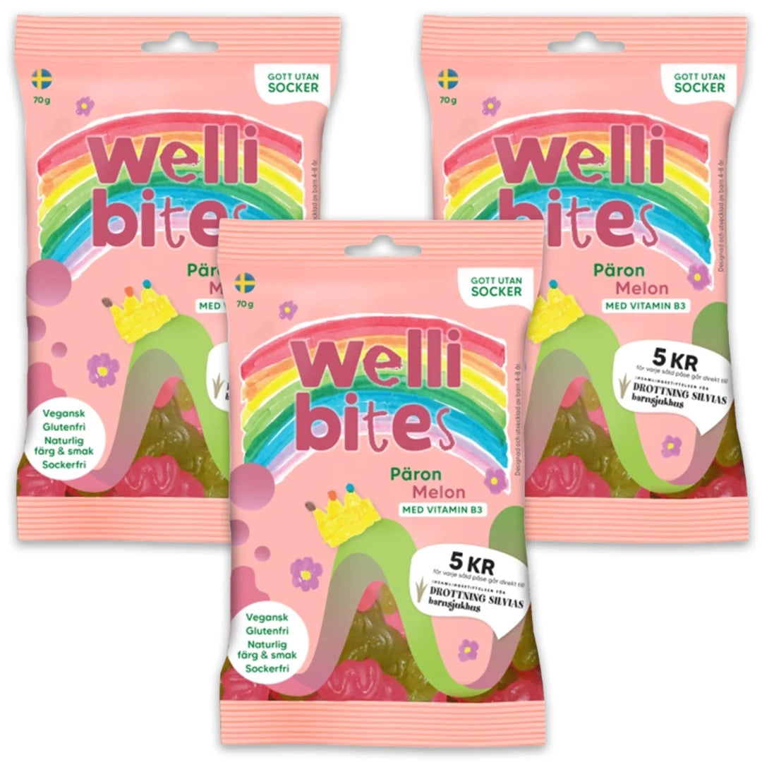 3 x Wellibites Candy 70 g Päron & Melon i tre rosa godteposer dekorert med en fargerik regnbue.