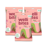 3 x Wellibites Candy 70 g Päron & Melon i tre rosa godispåsar dekorerade med en färgstark regnbåge.