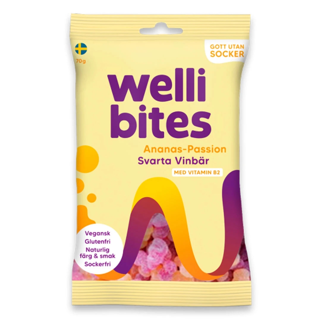 Wellibites Candy 70 g i en lysegul pose med lilla og oransje detaljer for smaken ananas-pasjonsfrukt og solbær., bilde 3 av 6