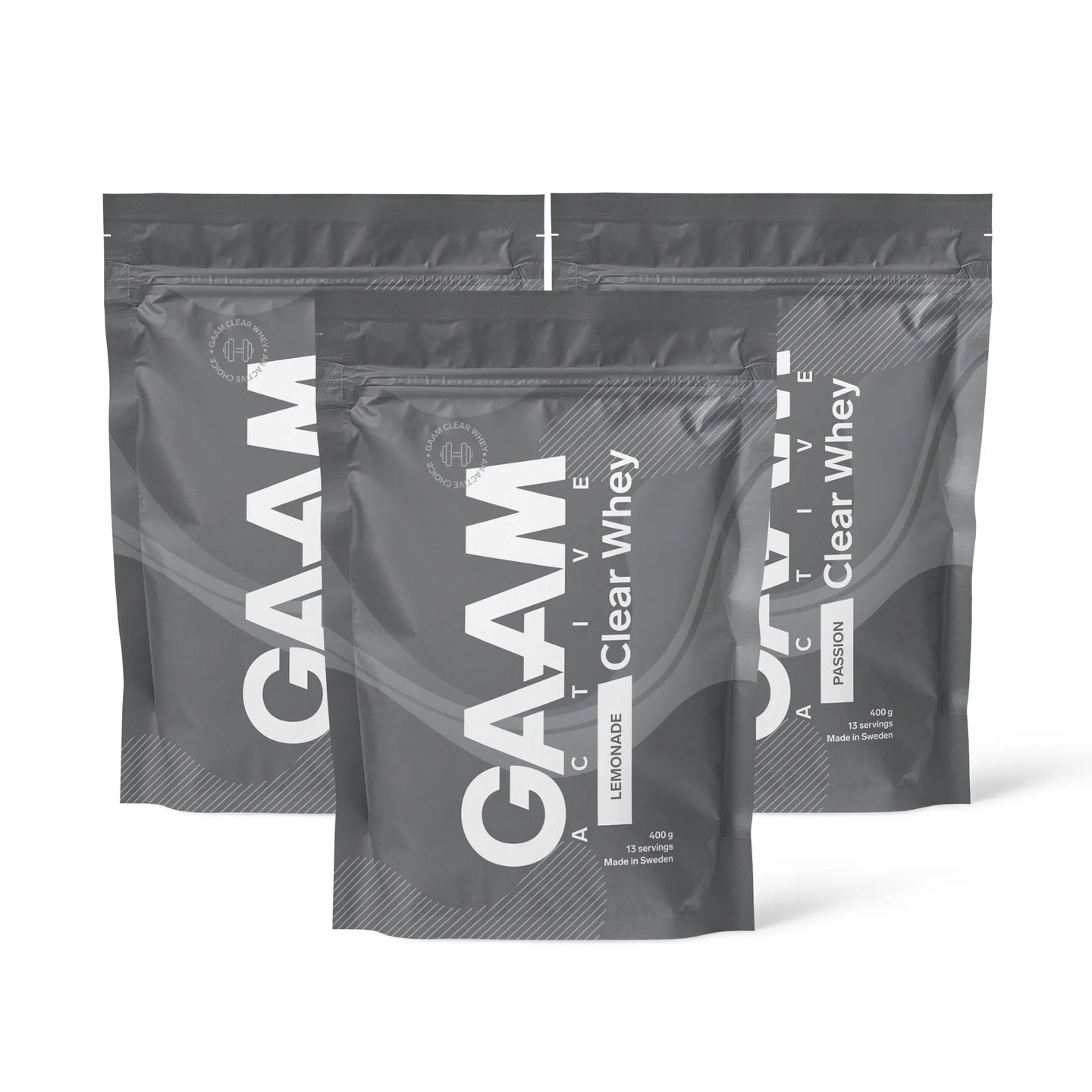 3 x GAAM Active Clear Whey Proteinpulver 400 g i grå poser med hvit tekst for smakene Lemonade og Passion.