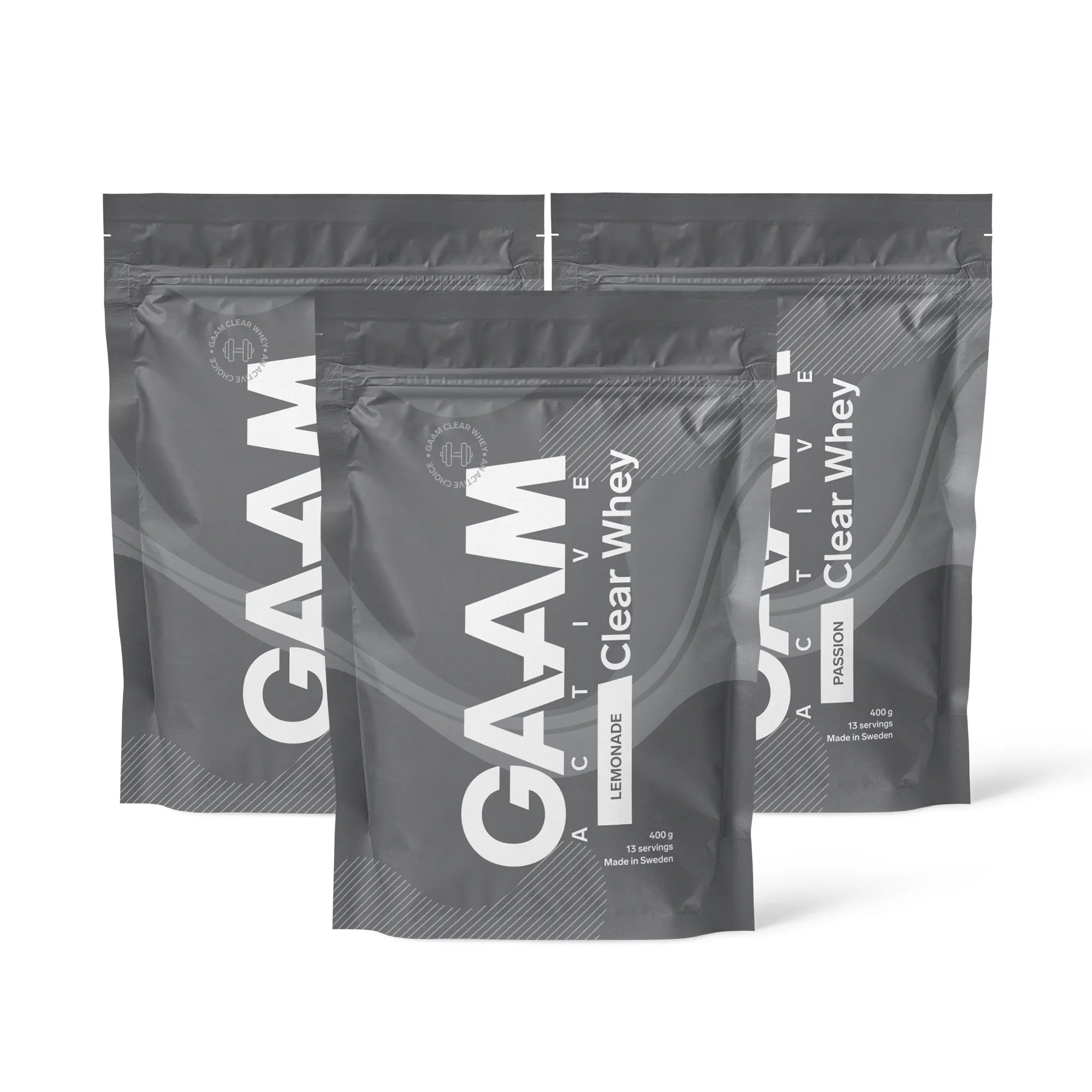 3 x GAAM Active Clear Whey Proteinpulver 400 g i grå poser med hvit tekst for smakene Lemonade og Passion.