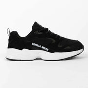 Gorilla Wear Newport Sneakers Black, en sportig svart sko i PU-läder och mesh med tjock vit sula.