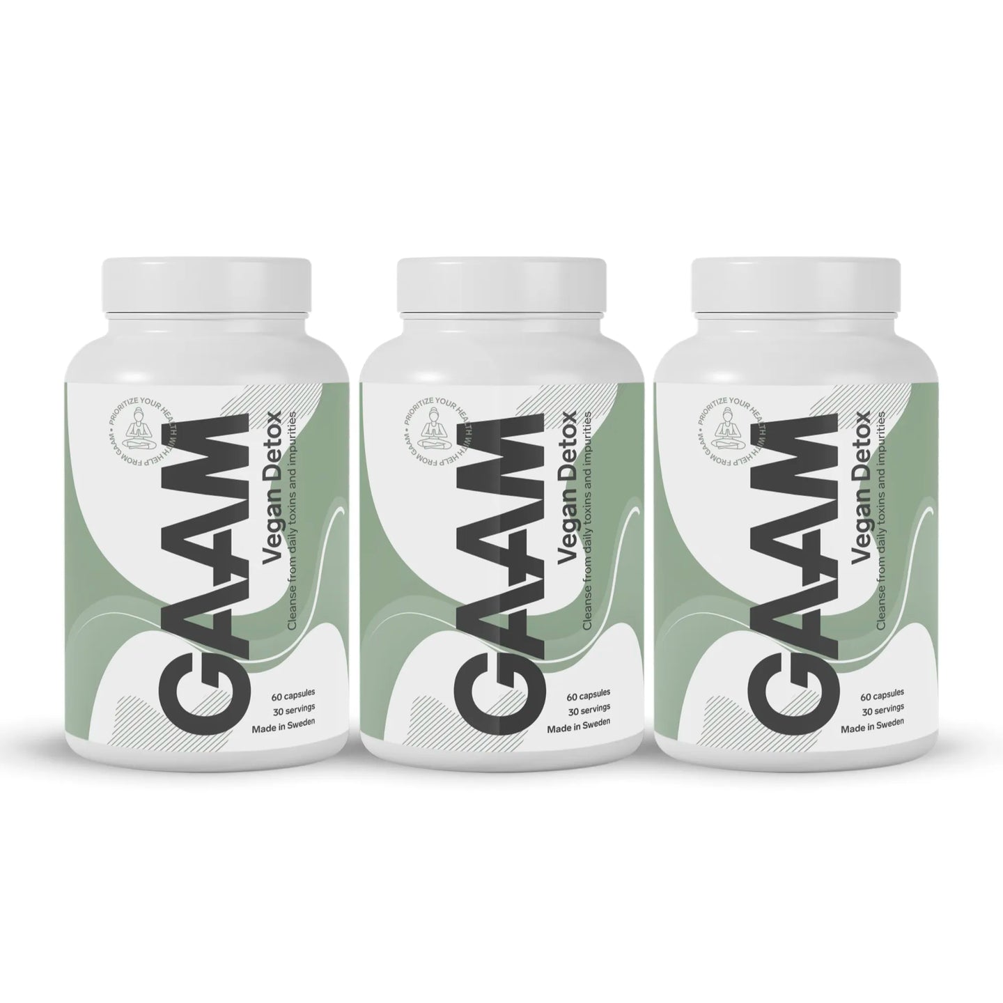 3 x GAAM Vegan Detox 60 caps i tre hvite bokser med grønne og svarte detaljer.