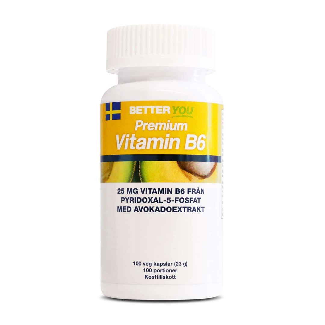 En hvit boks med Better You Premium Vitamin B6 100 caps, med en gul og hvit etikett med avokadomotiv.