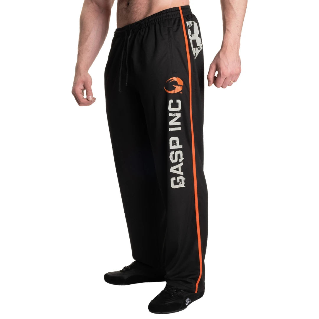 Gasp No 89 Mesh Pants Black, svarte treningsbukser i mesh med oransje stripe og stor logo på siden., bilde 4 av 6