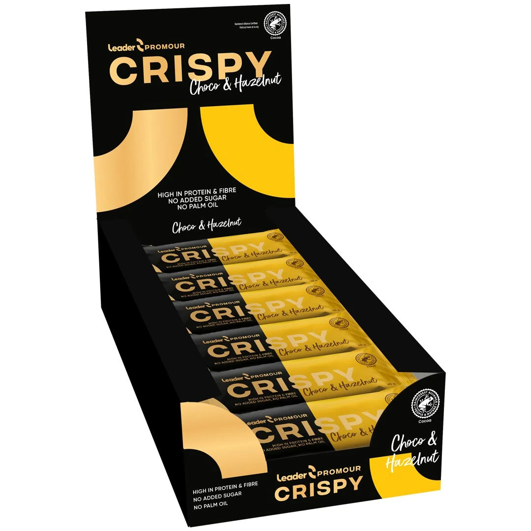 18 x Leader Promour Crispy 45 g Chocolate &amp; Hazelnut i en svart og gul displayeske med matchende proteinbarer., bilde 1 av 1