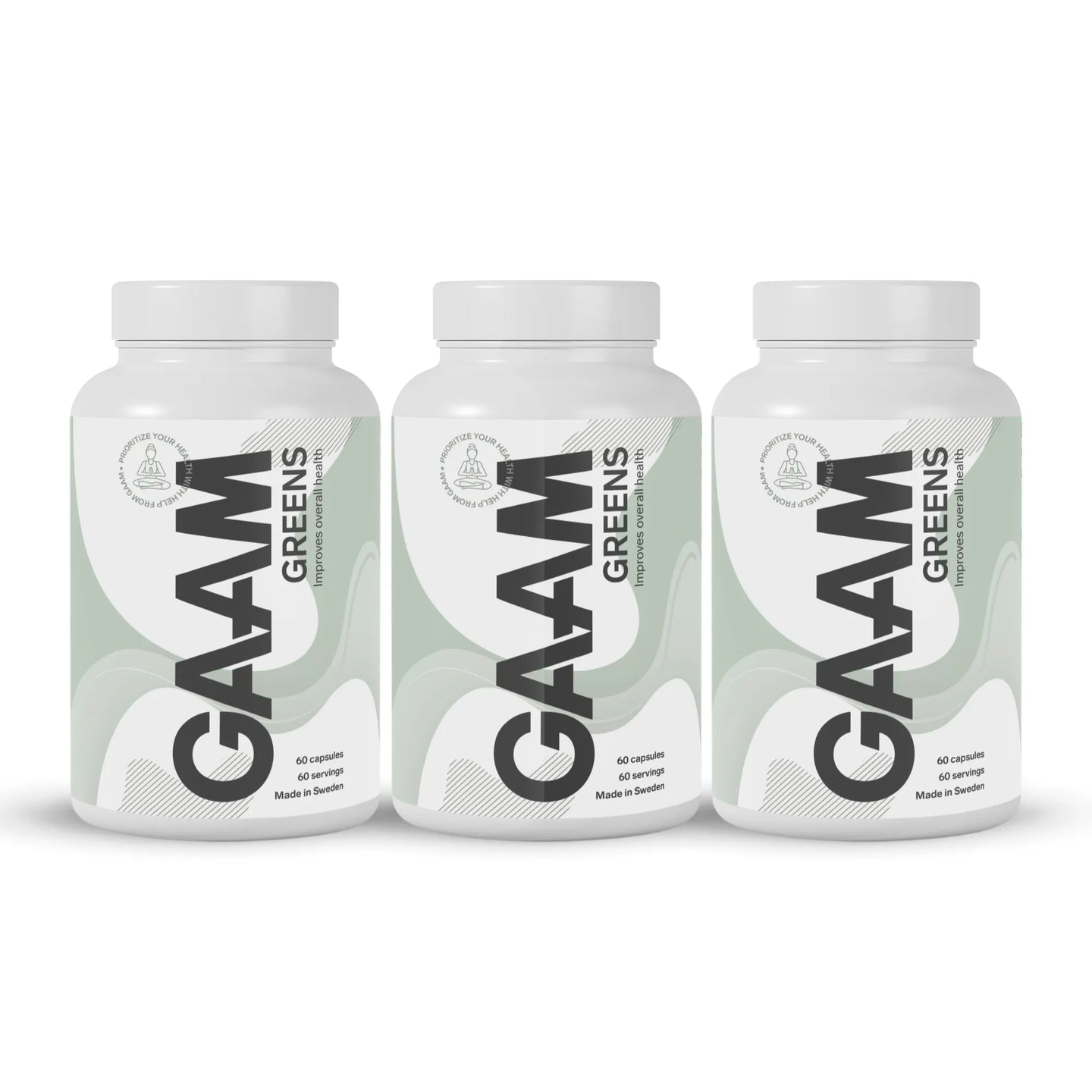 3 x GAAM Greens 60 Caps i tre hvite bokser med lysegrønne bølgemønstre og svart tekst.